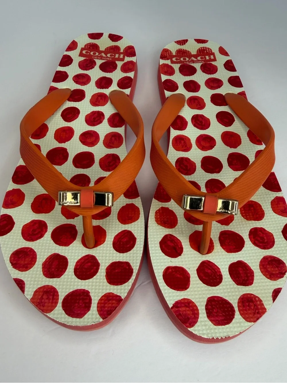 COACH Amel Coral Orange Polka Dot Flip Flops Sandals Gold Bow Women’s 7–8